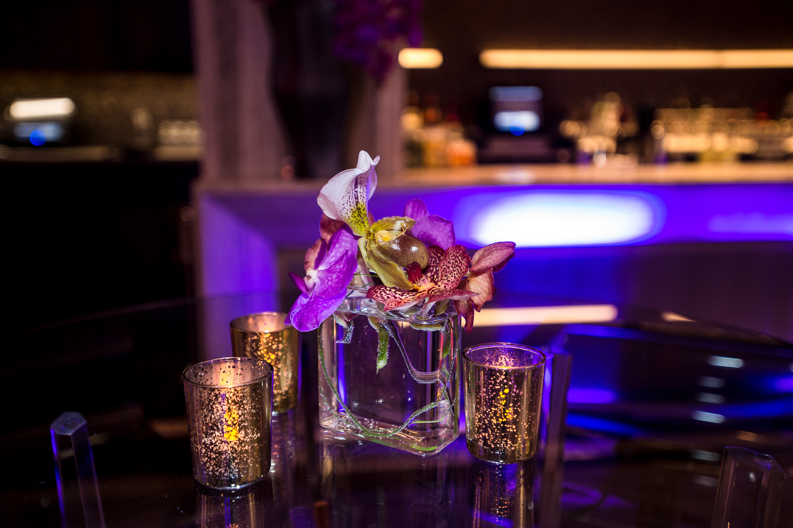 small orchid ladyslipper centerpiece at SixtyFive Bar and Lounge